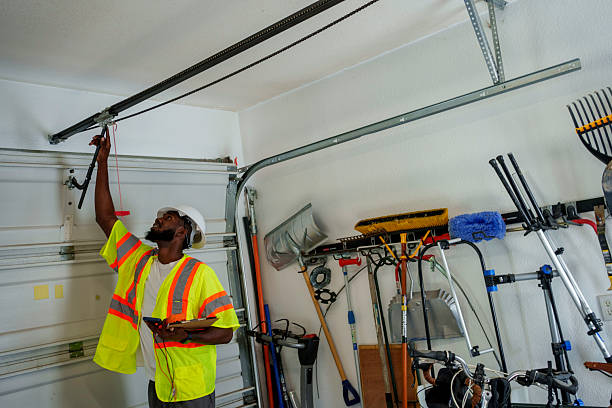 Professional Garage Door Panel Replacement technician working in Williamsburg city County, VA